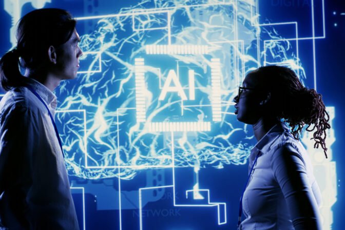 Dilligent BIPOC workers looking at hologram of artificial intelligence human brain simulation. Knowledgeable professionals interacting with AR AI visualization showing machine learning algorithms SSUCv3H4sIAAAAAAAAA4VRwbLbIAz8F53NDAYb4/xDT6+3Nz0IkBPmEZMxuG8yGf975cRpj+UkrVbSsnpADHCCSdvRWOMEhtCJbpxIuBCcGOw0eRu8VLqHBgJWglOrdWet4galtJH8GnBYoofTA2JKa6kL1phnOHFloTnQ8gwpxJqXiImzrYFSsa6FCrdx5nn2mavP/D3v87HjLPAn+cucUz7fWUZZHUM/YvGUEs6U1wJb86Z++Eizp//y/hJg+9UAnrnpvkvZds2J8KnsEyRZb/wgxdAOWnTWGYE0emFJsQWjxZYkj5JILdmWaT0Nouv8JLC3JNCZQWpljTGaaZ0jUq0bhSHfis4EI9zUonCepOqdVNhrYDlf35WW62FNrpfdQRae17ku95f4lPMNXeKDTJgKNXDBUpgQDoAbb0v0cT4fBvNd8vUVz7nuv3t6ULP/iuFY9brJJTK673nAeksZA4WjvLprrPWdLvQ70vc/9rZtfwBaITseUQIAAA==